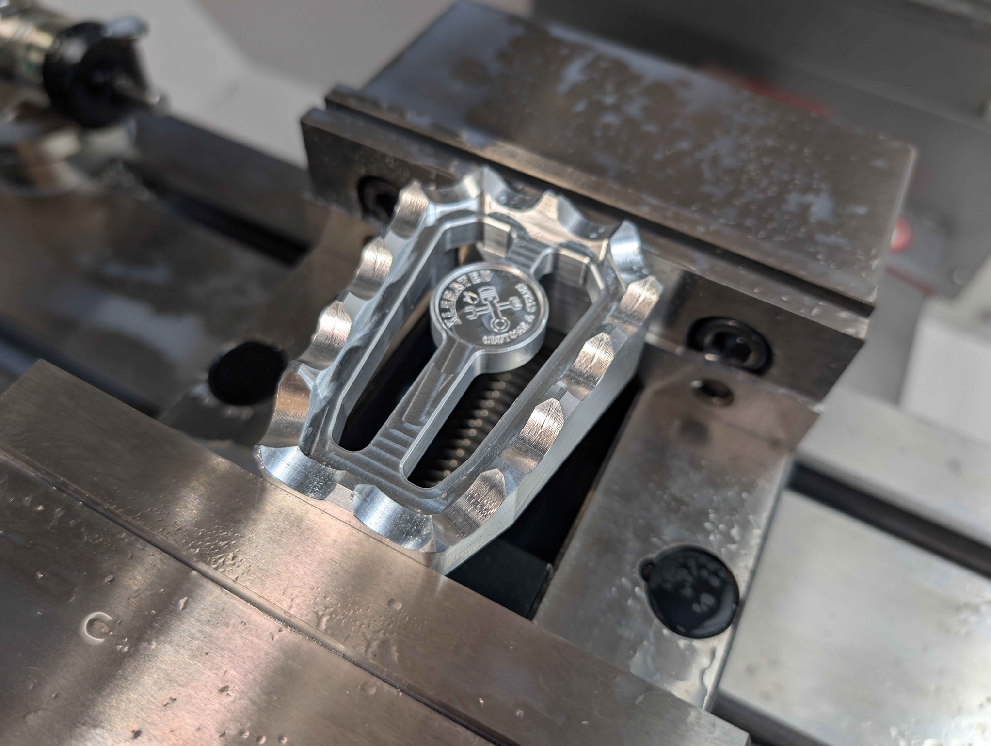 Custom Harley-Davidson foot peg — CNC machined from billet aluminum